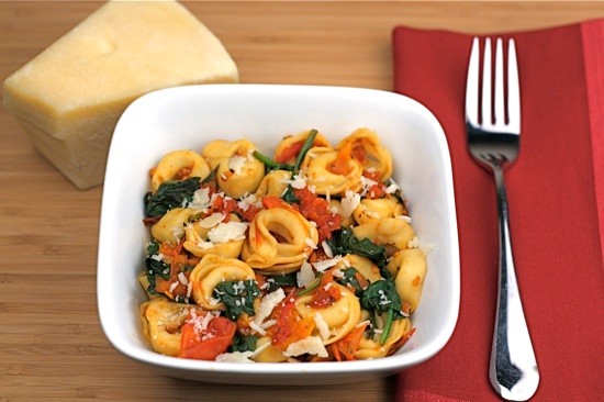 Cheese tortellini with spinach and slow roasted tomatoes