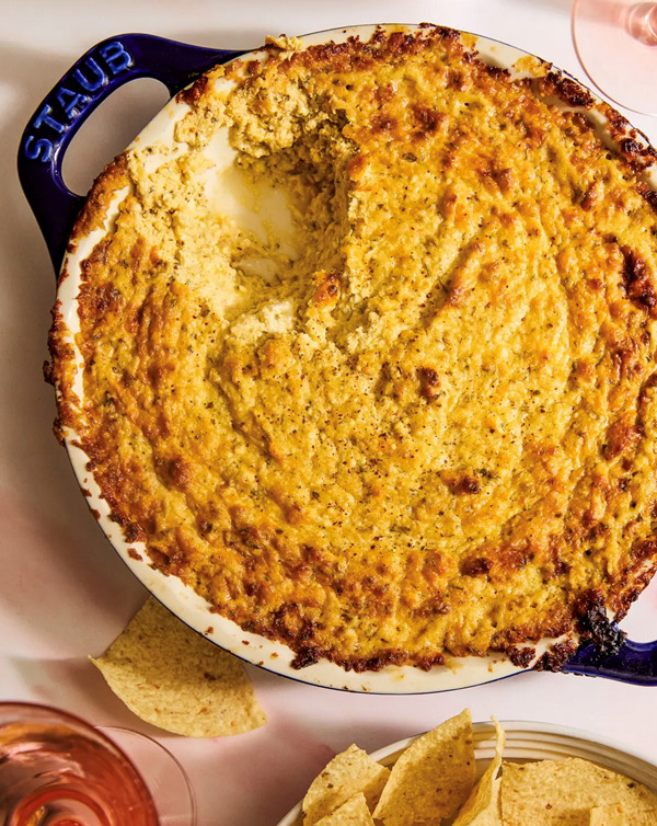 Cheesy artichoke dip with preserved lemons and harissa