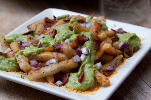 Cheesy avocado bacon poutine