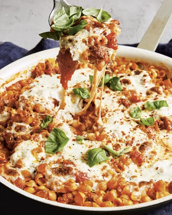 Cheesy baked pasta with tomato, sausage, and ricotta