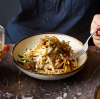 Cheesy caramelised onion and pine nut pasta