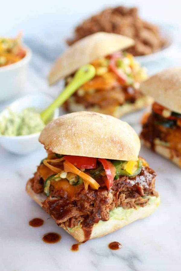 Cheesy crockpot Cajun pulled pork with Southwest pepper-corn slaw