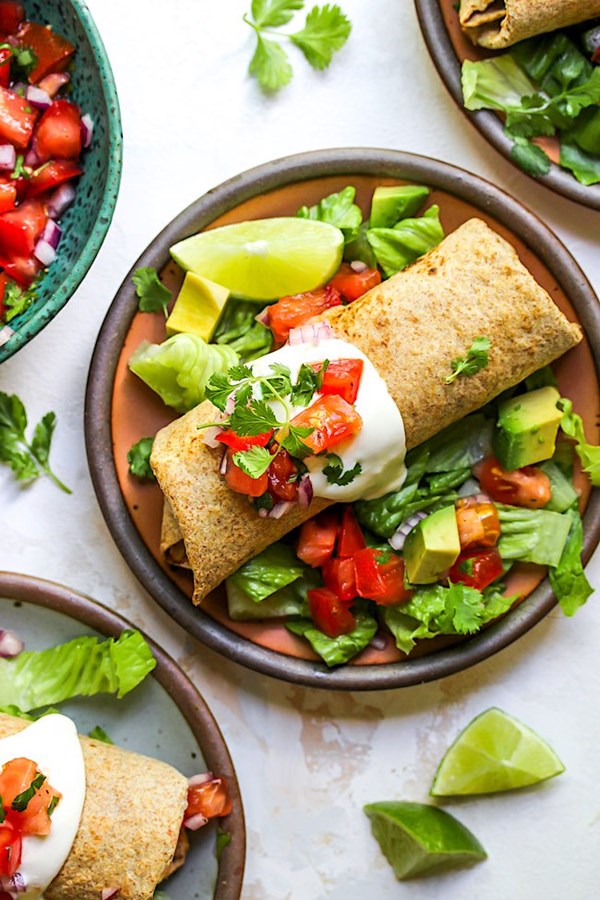 Cheesy green chile chicken chimichangas