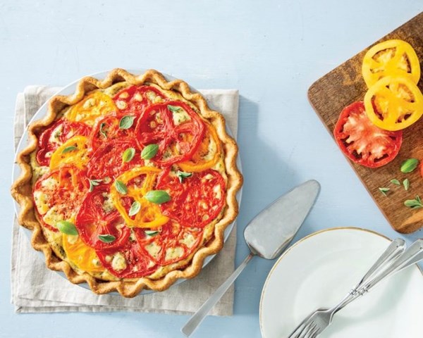 Cheesy heirloom tomato and herb pie