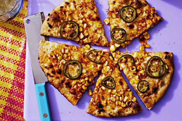 Cheesy masala corn pizza