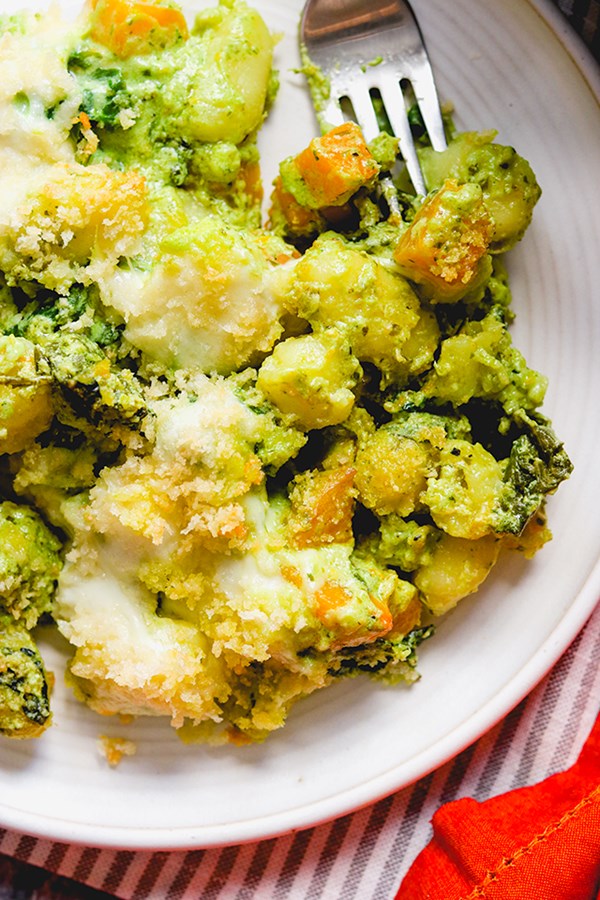 Cheesy pesto baked gnocchi with butternut squash and kale