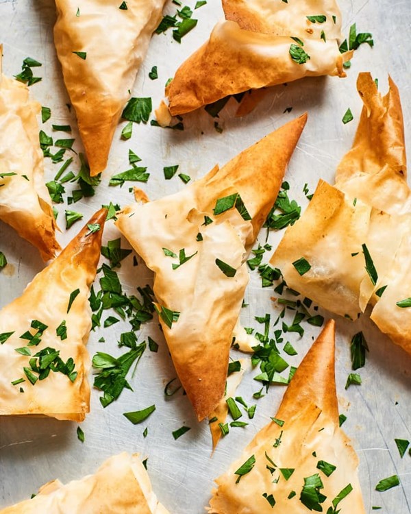 Cheesy phyllo triangles