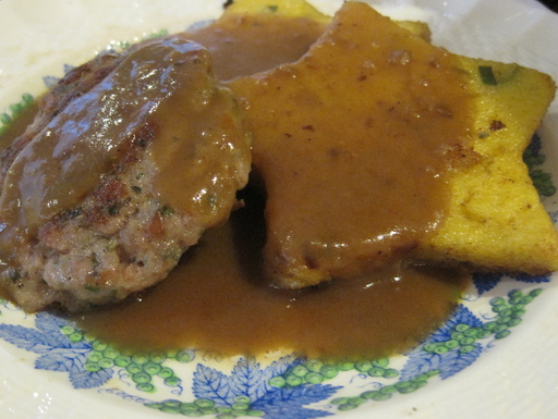 Cheesy polenta with sage breakfast sausage and red eye gravy