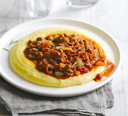 Cheesy polenta with sausage ragout