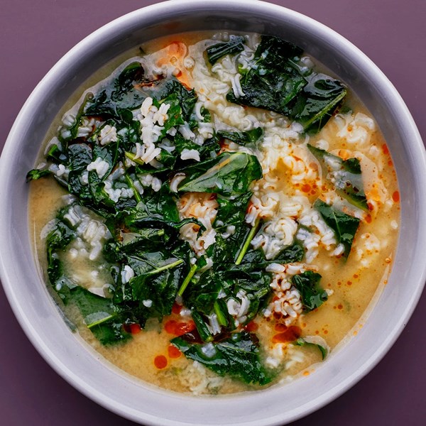 Cheesy rice porridge with greens