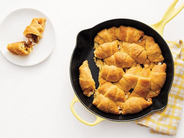 Cheesy skillet crescent rolls with caramelized onions 
