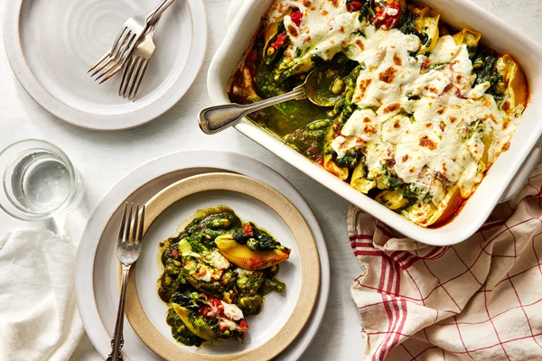 Cheesy stuffed shells with kale pesto