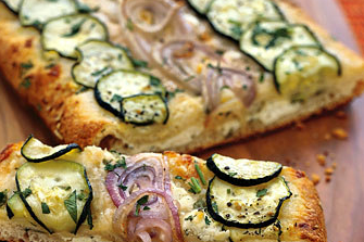 Cheesy zucchini and red onion flatbread