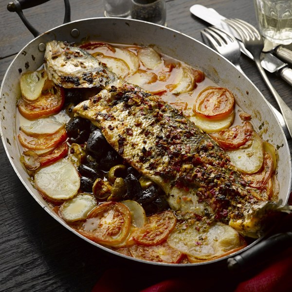 Chermoula-marinated sea bass stuffed with olives & preserved lemon 