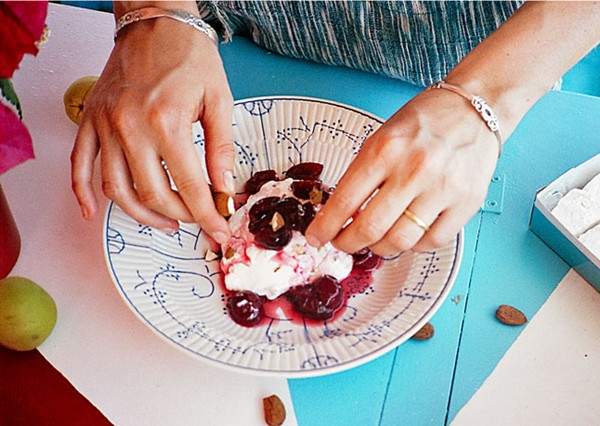 Cherries in almond syrup over Greek yogurt