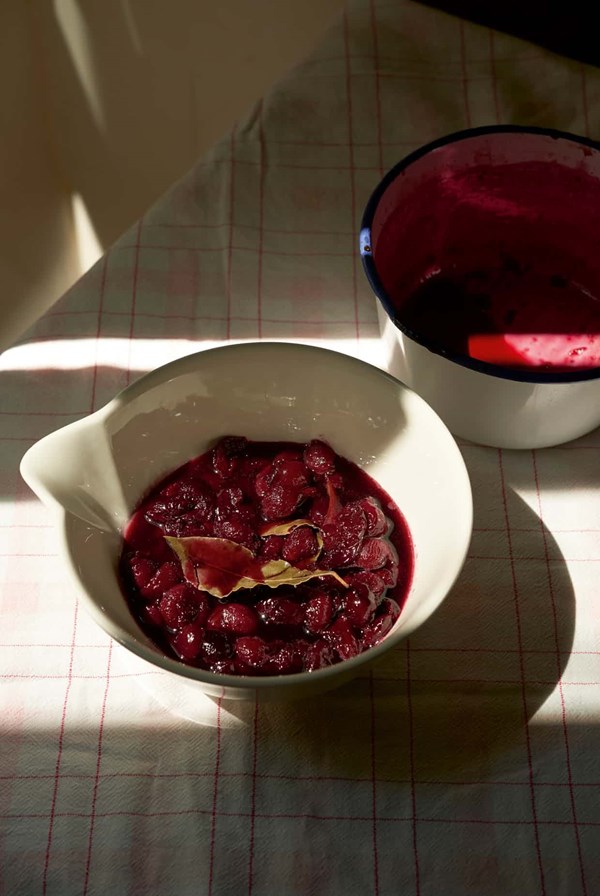 Cherries in syrup with bay leaves