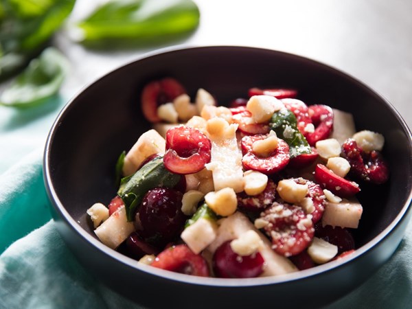 Cherry and jicama salad with lime and macadamia nuts