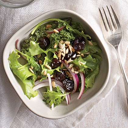Cherry and sunflower seed kale salad