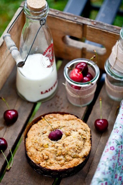 Cherry cakes with pistachio crumble topping
