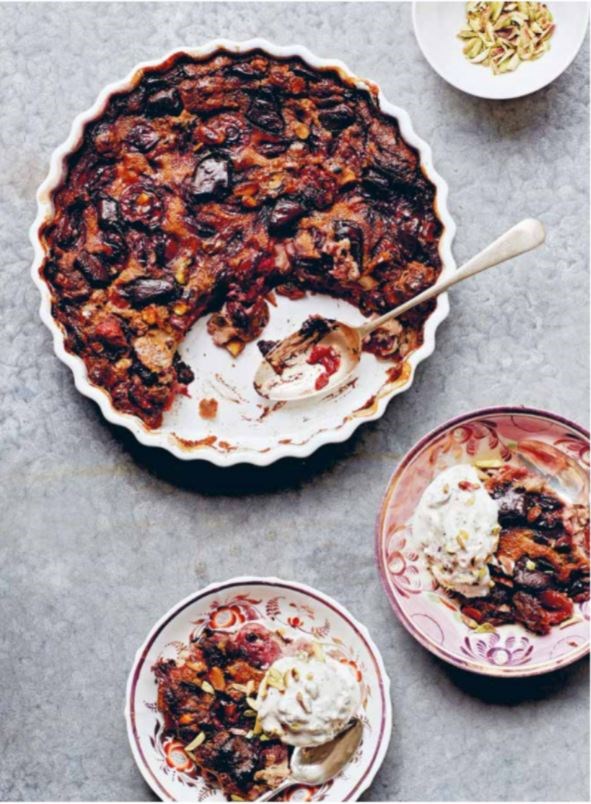 Cherry, pistachio and dark chocolate clafoutis with chocolate chip frozen yogurt