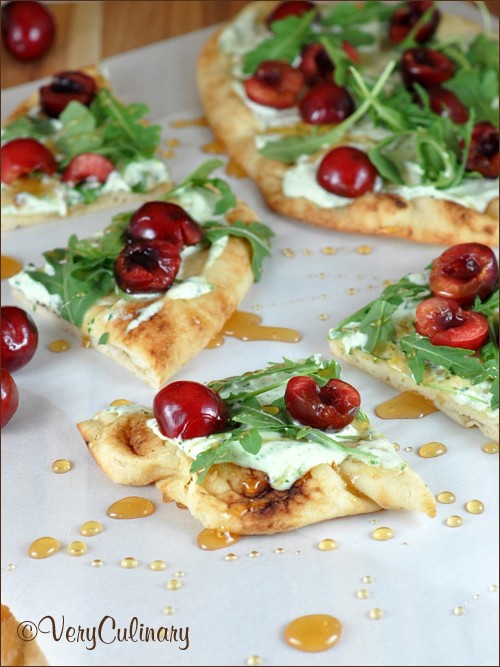 Cherry pizza with herbed mascarpone and arugula