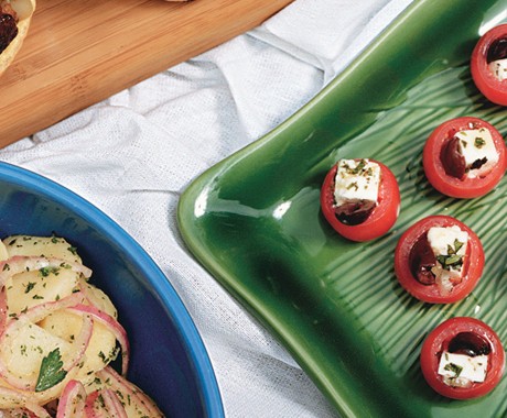 Cherry tomatoes stuffed with marinated feta