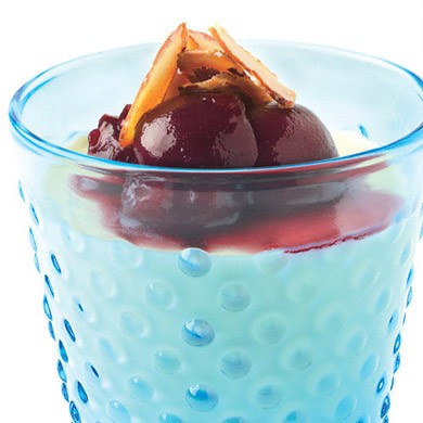 Cherry-topped almond panna cotta