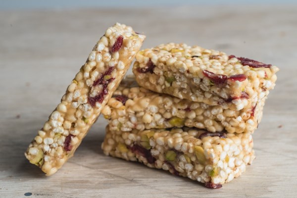 Chewy cranberry, millet and pistachio bars