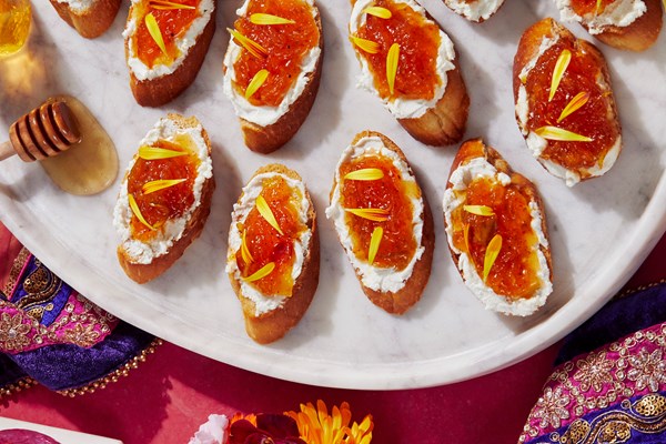 Chhundo and goat cheese crostini