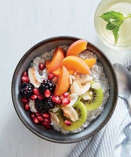 Chia pudding with kiwi, blackberries, apricots & pomegranate
