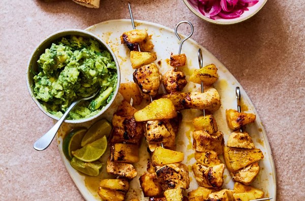 Chicken & pineapple kebabs with smashed avocado and pickled onions