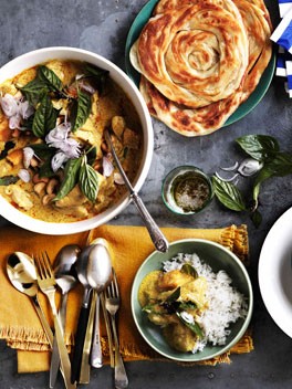 Chicken and bamboo-shoot yellow curry with roti and rice