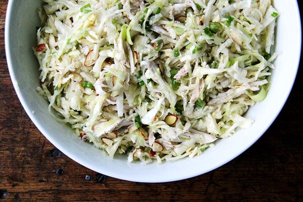 Chicken and cabbage salad with sesame seeds, scallions & almonds