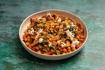 Chicken and chickpea stew with green olive salsa, ricotta and crispy chicken skin