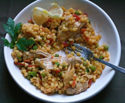 Chicken and Israeli couscous with tomato and lemon