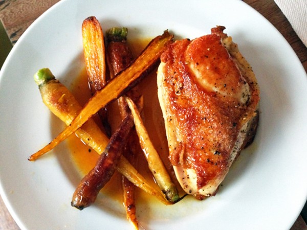 Chicken and multi-colored carrots in tangerine sauce