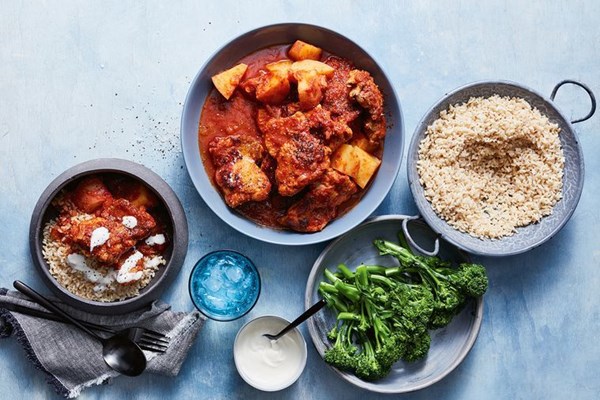 Chicken and potatoes in tomato and cardamom sauce
