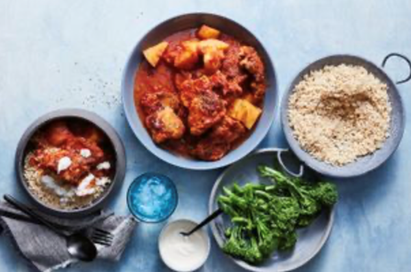Chicken and potatoes in tomato and cardamom sauce
