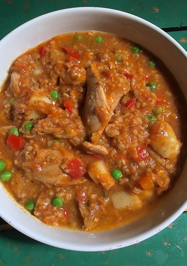 Chicken and rice soup with achiote (Aguado de gallina)