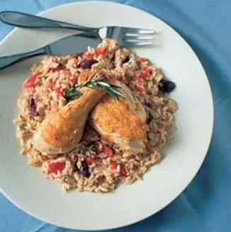 Chicken and rice with saffron, peas, and paprika