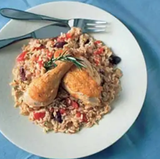 Chicken and rice with tomatoes, white wine, and parsley