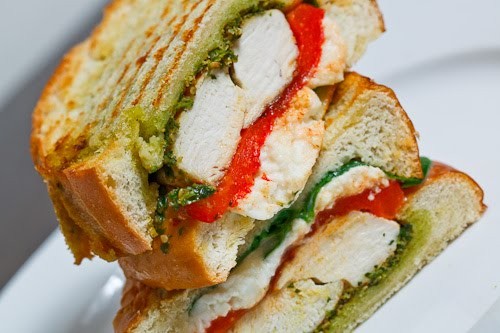 Chicken and roasted red pepper panini with cilantro pesto and feta
