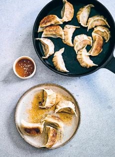Chicken and shiitake gyoza with miso lemon dipping sauce
