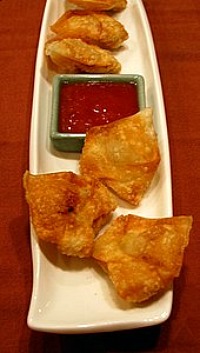 Chicken and shrimp won tons with chili-sweet & sour sauce