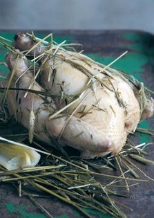 Chicken baked in hay with chicken fat rice