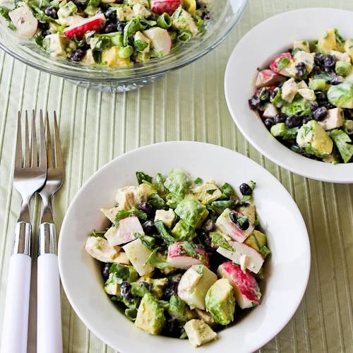 Chicken, black bean, avocado, and radish salad with lime and cilantro