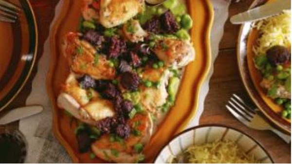 Chicken, black pudding, broad beans and peas with garlic sauce