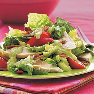Chicken BLT salad with creamy avocado-horned melon dressing