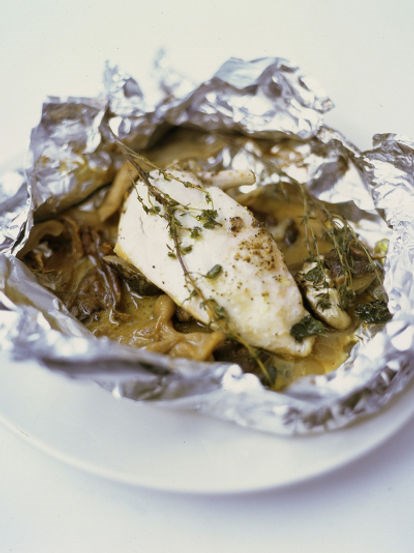 Chicken breast baked in a bag with mushrooms, butter, white wine and thyme
