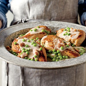 Chicken breast with pancetta cream and peas